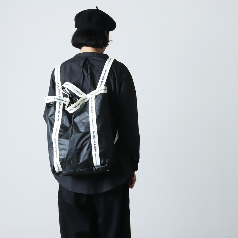beautiful people(ӥ塼ƥեԡץ) sail cloth logo tape backpack white-black