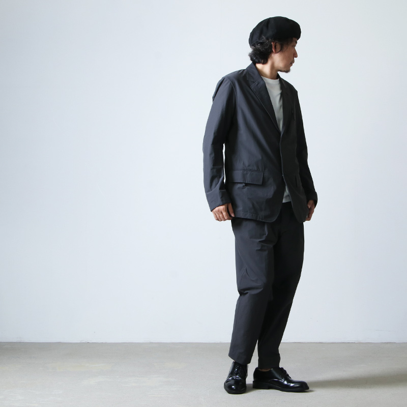 and wander (アンドワンダー) plain tailored stretch jacket