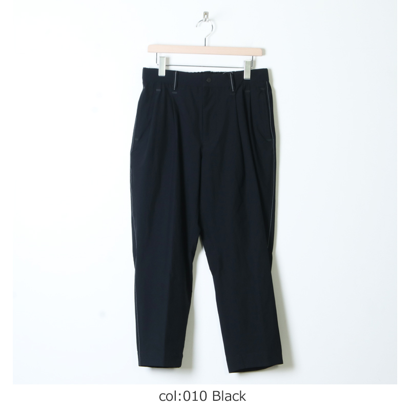 and wander(ɥ) plain tapered stretch pants