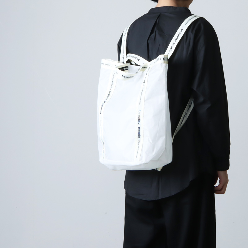 beautiful people(ӥ塼ƥեԡץ) sail cloth logo tape backpack white-black