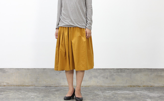 Dahl Ia 形状記憶ロングスカート Col Mustard Cotyle